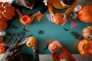 Happy family preparing for Halloween.