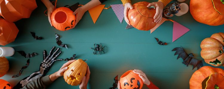 Happy family preparing for Halloween.